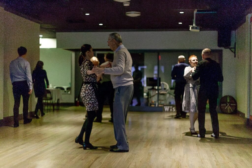 Couples enjoying dance practice at Moonlight Ballroom