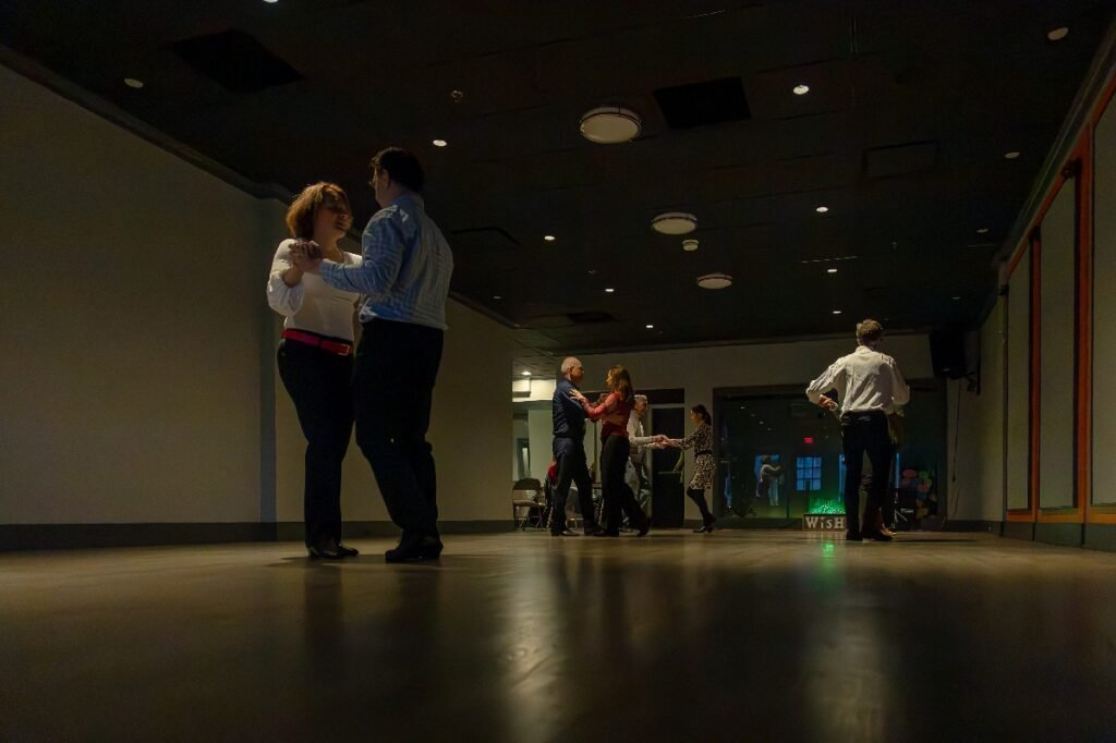 Couples enjoying dance practice at Moonlight Ballroom