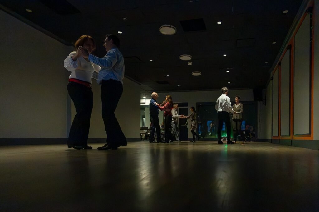 Couples enjoying dance practice at Moonlight Ballroom